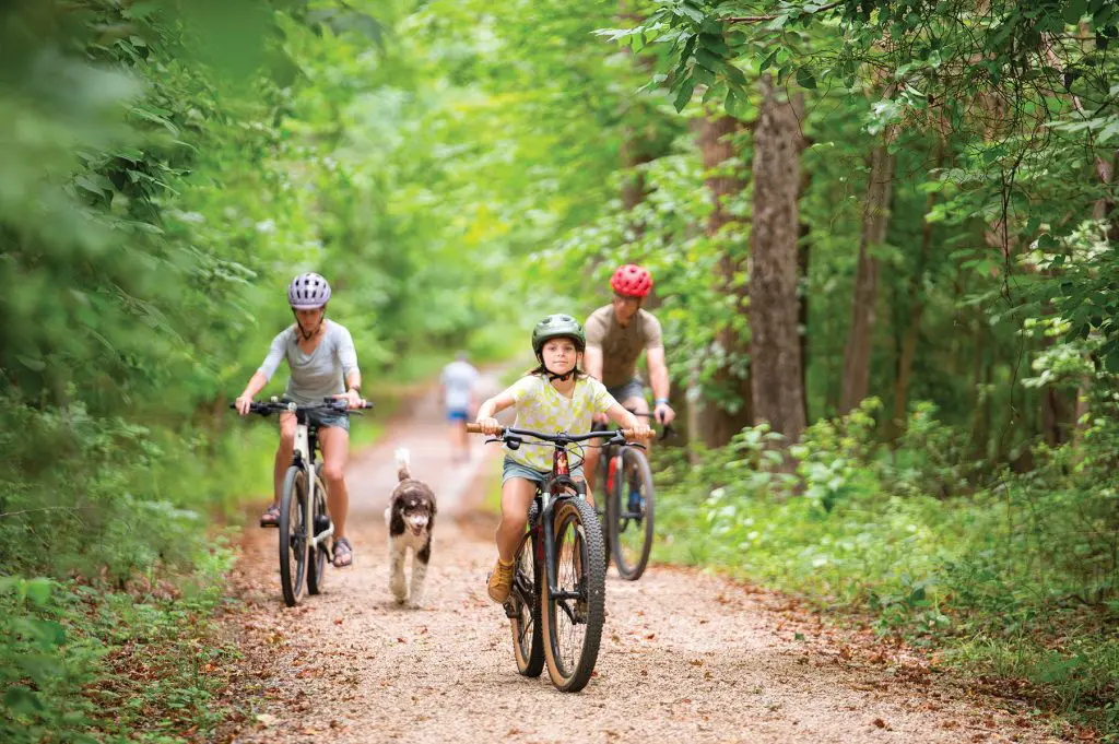 family riding bikes