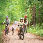 family riding bikes