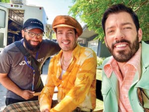 Thomas with Jonathan and Drew Scott while filming HGTV's A Very Brady Renovation. Photo courtesy of Keith Thomas