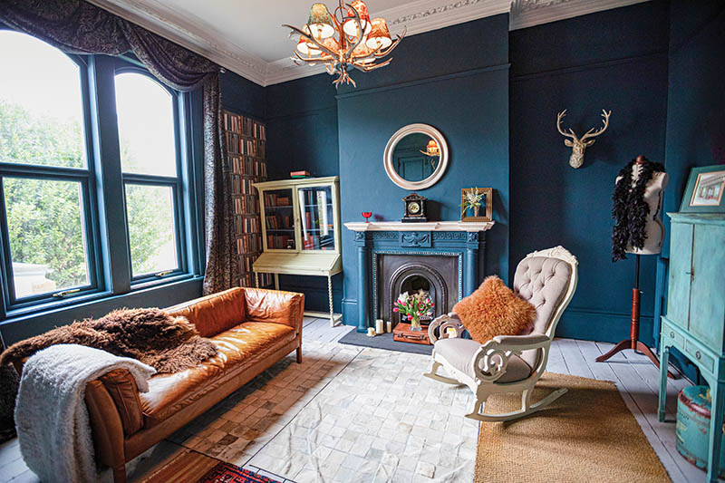 Drawing room with high ceilings and architectural features