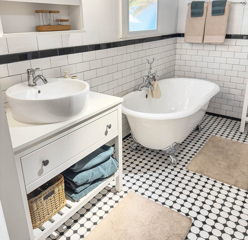 Free standing bathtub in a stylish bathroom