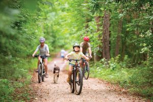 family riding bikes