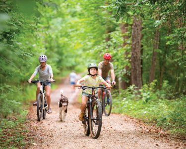 family riding bikes