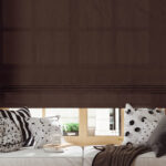 Blank roman blind on a window with wide windowsill mockup. 3D rendering